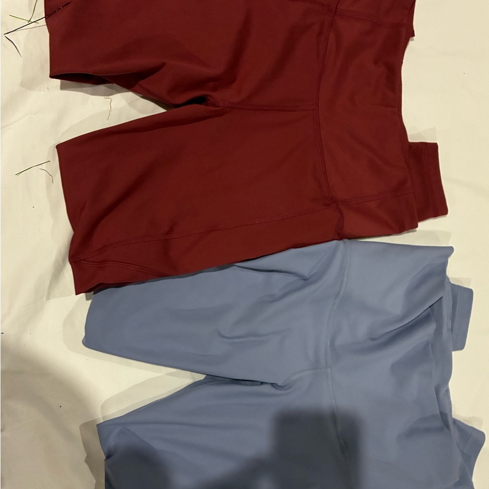 All in Motion Brick Red Athletic leggings and powersoft light blue leggings